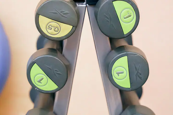 Light dumbbells arranged on an A-frame stand